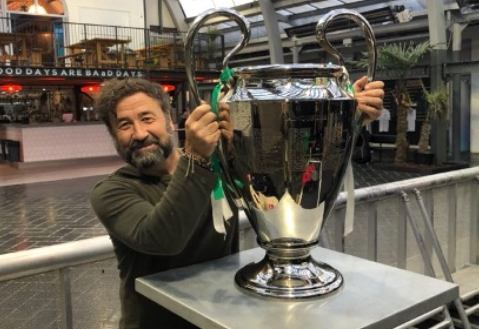 Pre-gig in Glasgow, holding the old European Cup