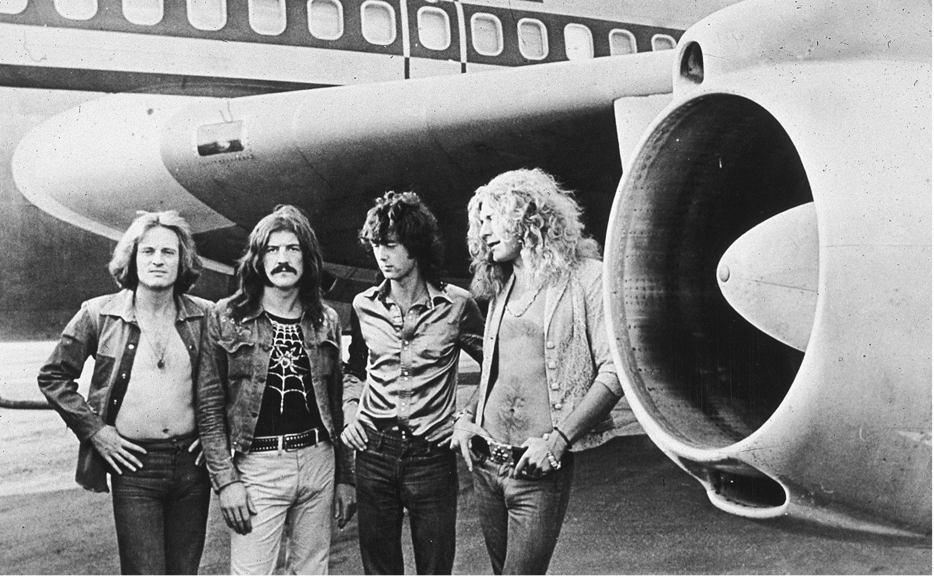 Led Zeppelin on the road.  ‘According to a recent study, musicians are twice as likely to suffer from depression and anxiety, not because the arts attract melancholics but because of things like antisocial working hours, lack of support from people in positions of authority, and time away from home’ (Far Out magazine 2022). Photo by Hulton Archive/Getty Images.