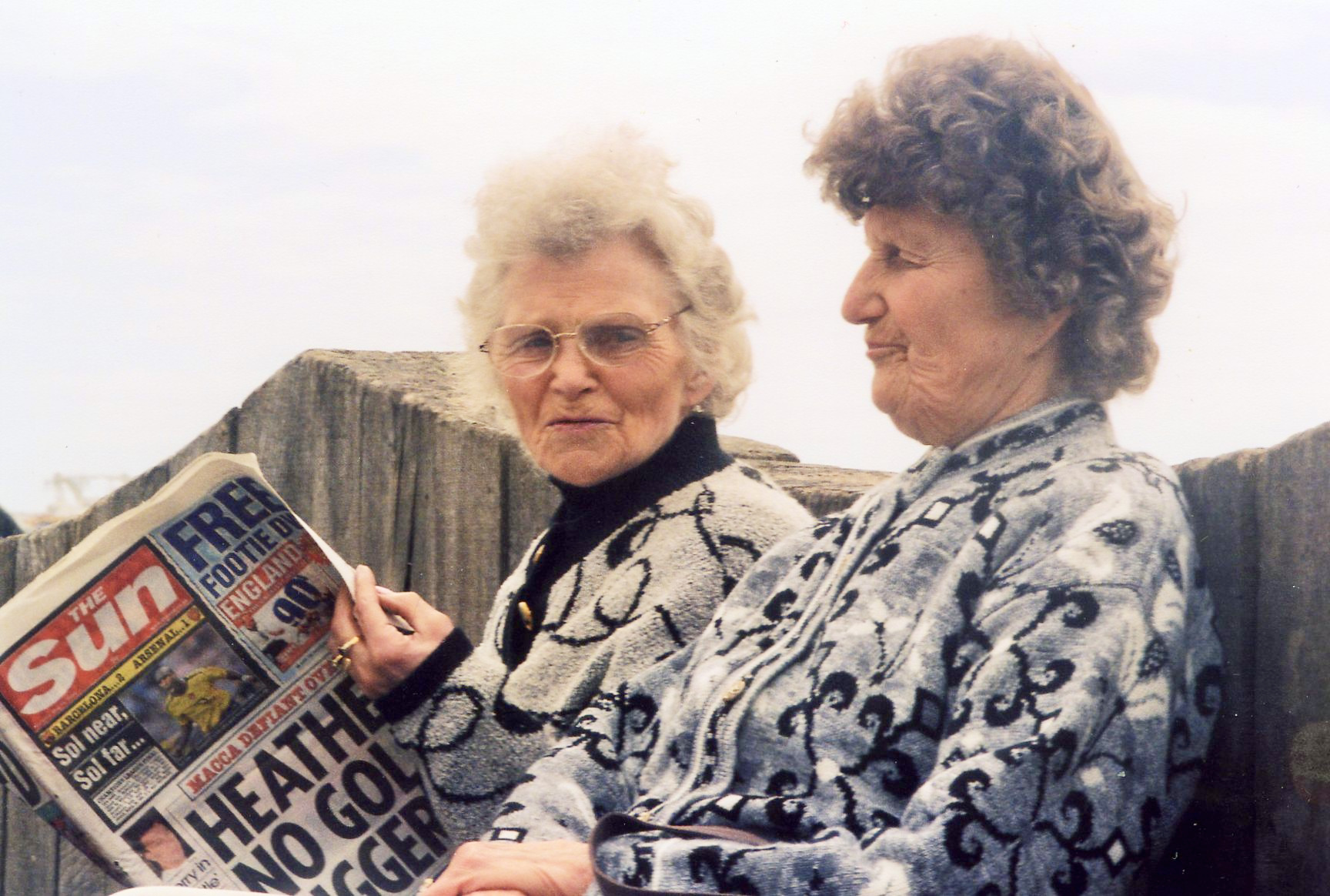 Two ladies, Brighton 2006. I took this from my waist at a guessed focus, f-stop, and shutter speed. Analogue film camera.