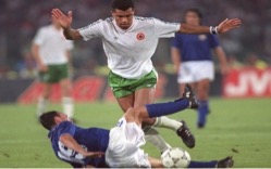 Paul McGrath, a deity of sorts, ceremoniously dumping Mr Golden Ball, Salvatore Schillaci, in the World Cup quarter Final Vs Italy in 1990